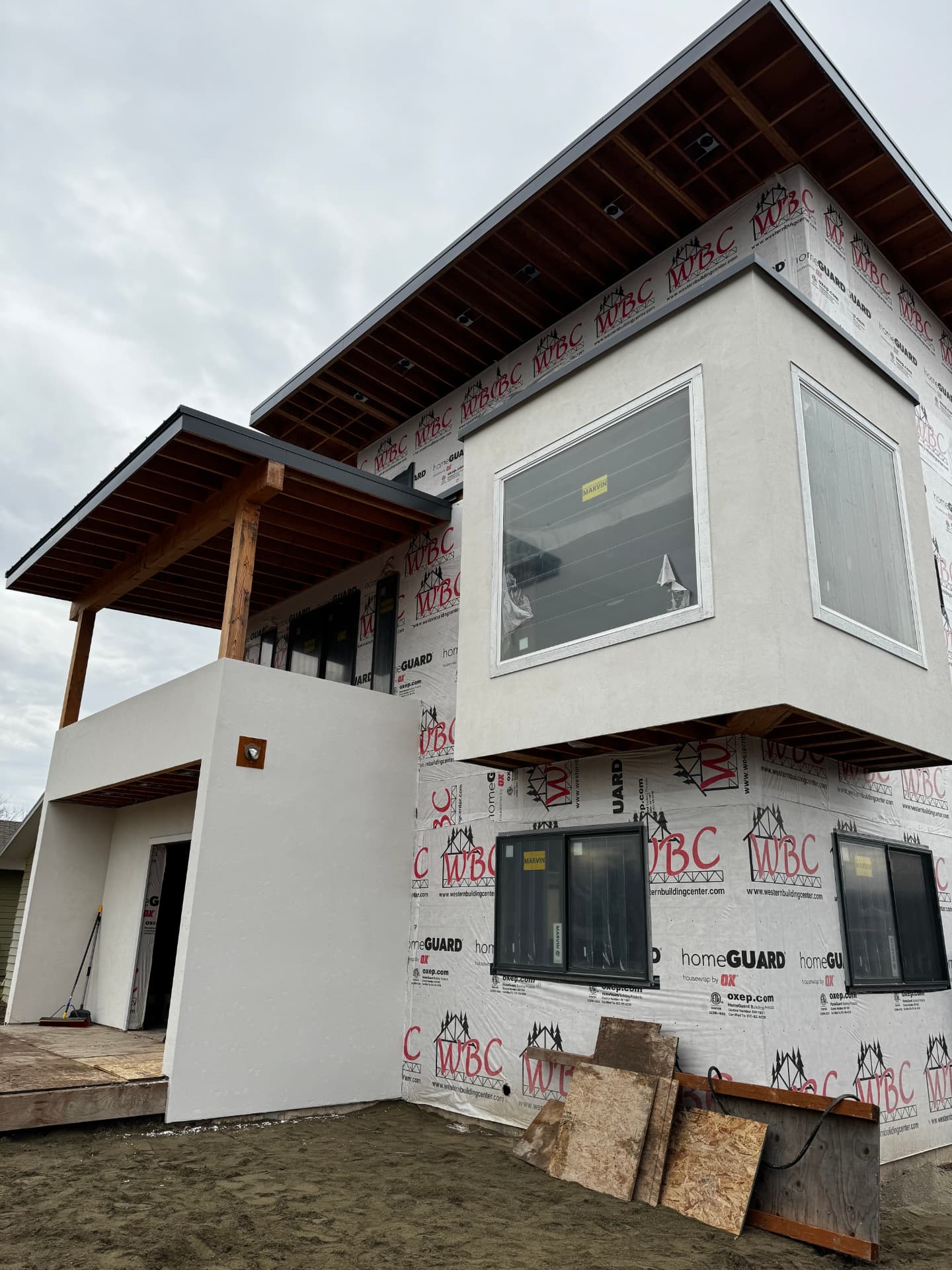 Stucco crack repair patched and texture matched on a Kalispell, MT home