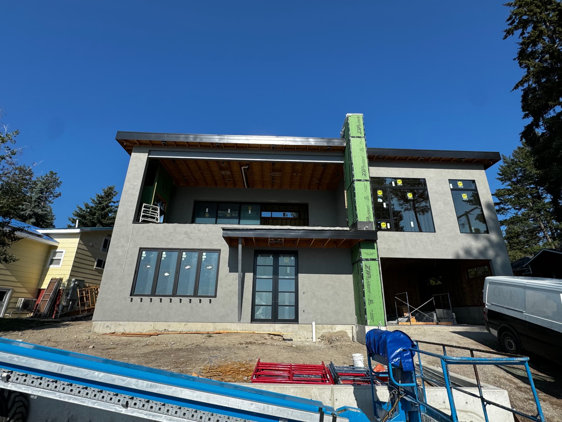 Grey stucco exterior on a new two-story home in Kalispell, MT
