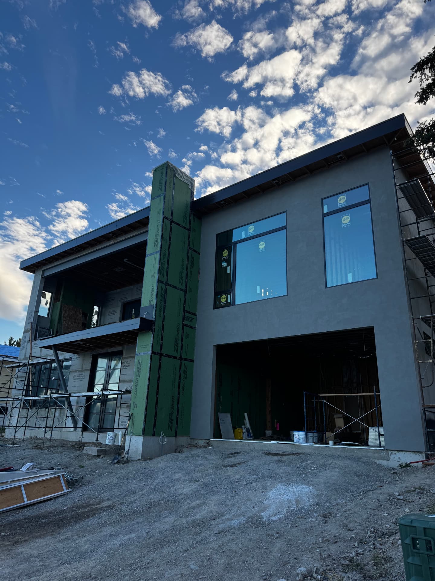 Hand-troweled stucco finish coat being applied in Whitefish, MT