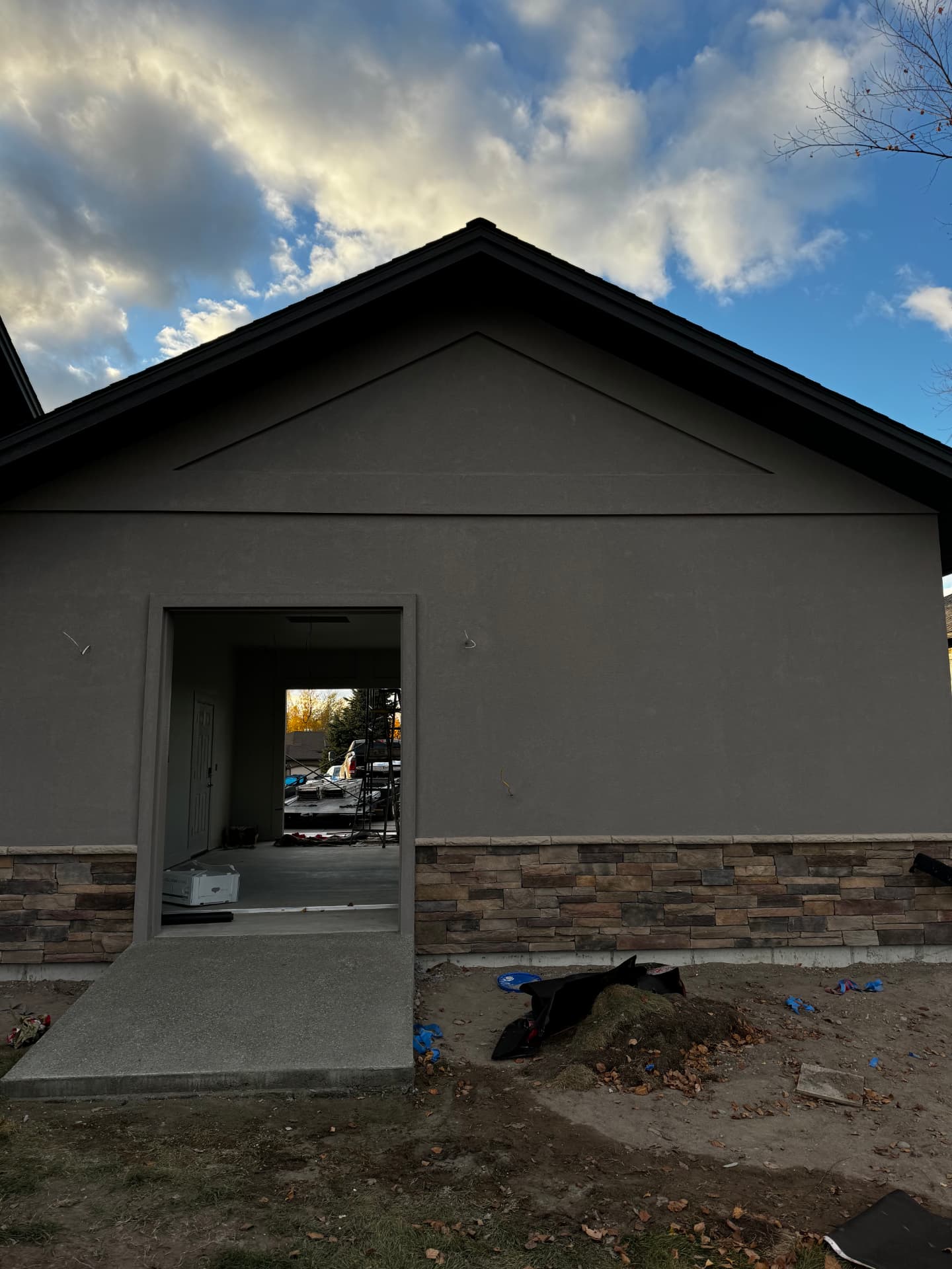 1990s Exterior Brought Current — Re-stucco & paint · Central Kalispell by DL Construction